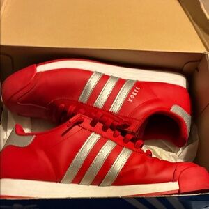 Adidas Red Sneakers with Silver Stripes